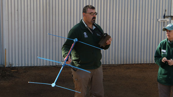 Taronga Staff member using Very High Frequency (VHF) radio to locate a tracker 